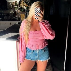 Pink smocked long sleeve crop top
